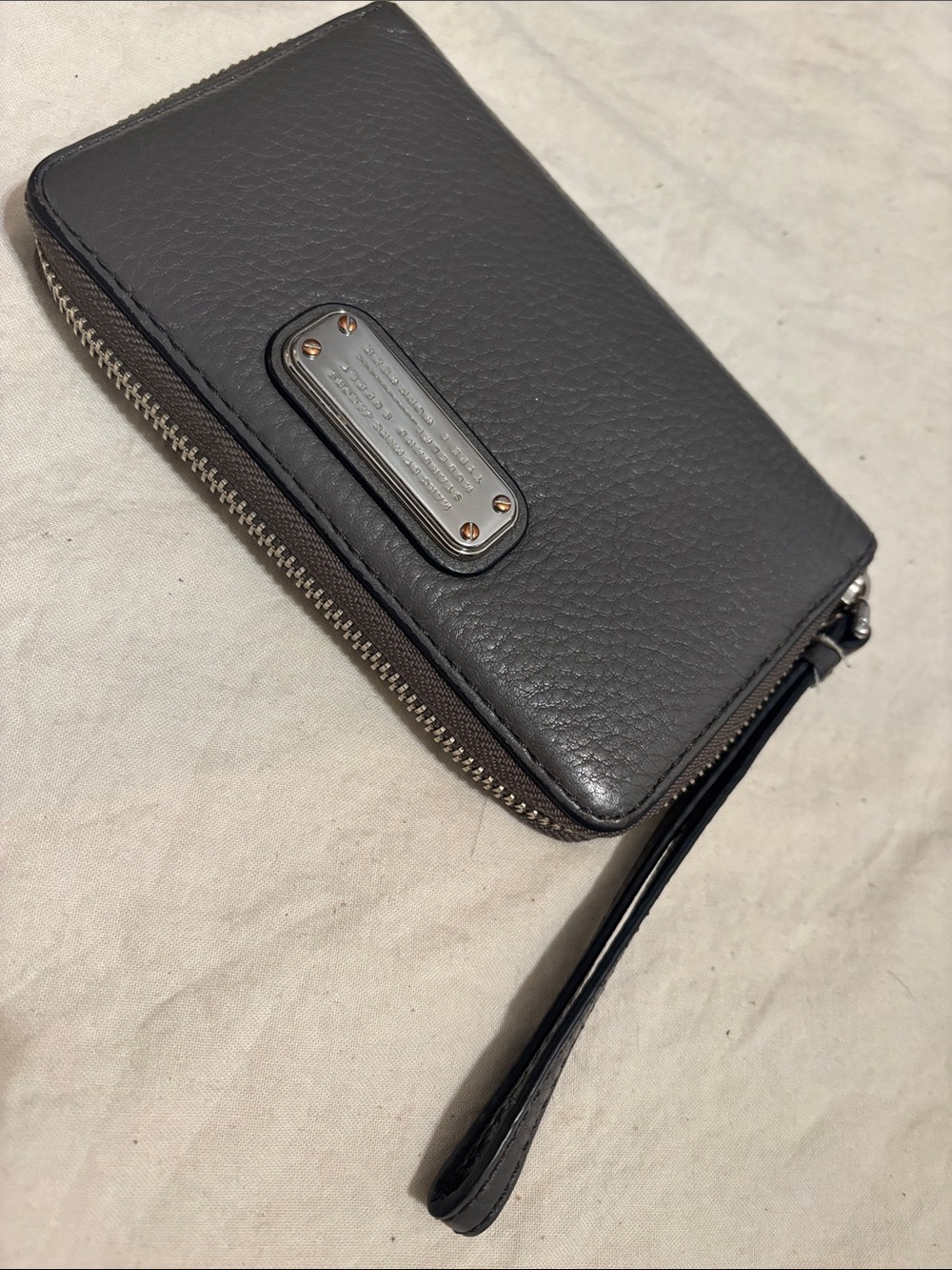 Black Leather Zip Wristlet with Metal Plaque